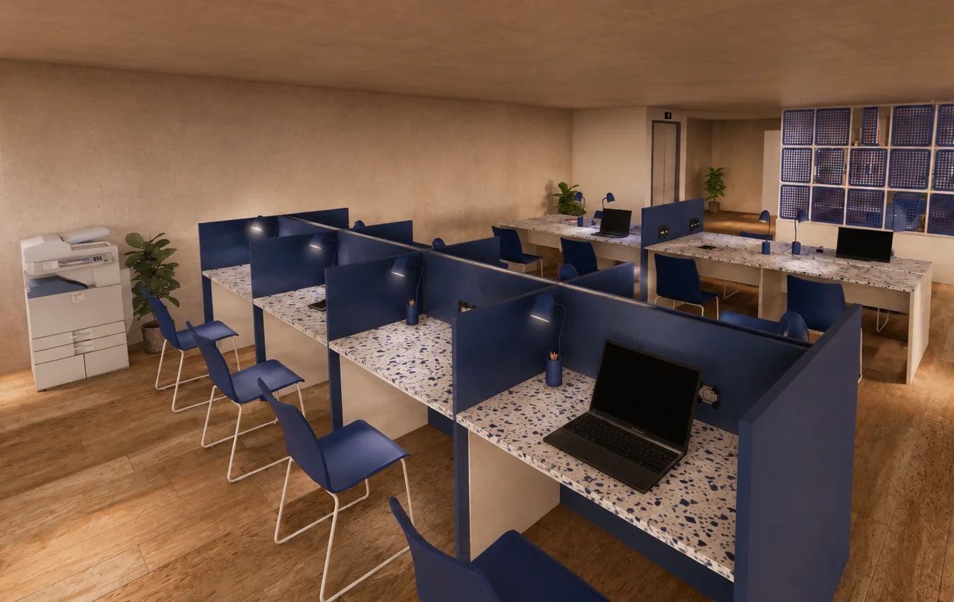 Espace de coworking avec bureaux cloisonnés bleu marine et plans de travail en terrazzo